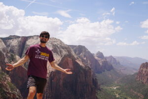 Dylan Davino on top of a mountain in Zion National Park